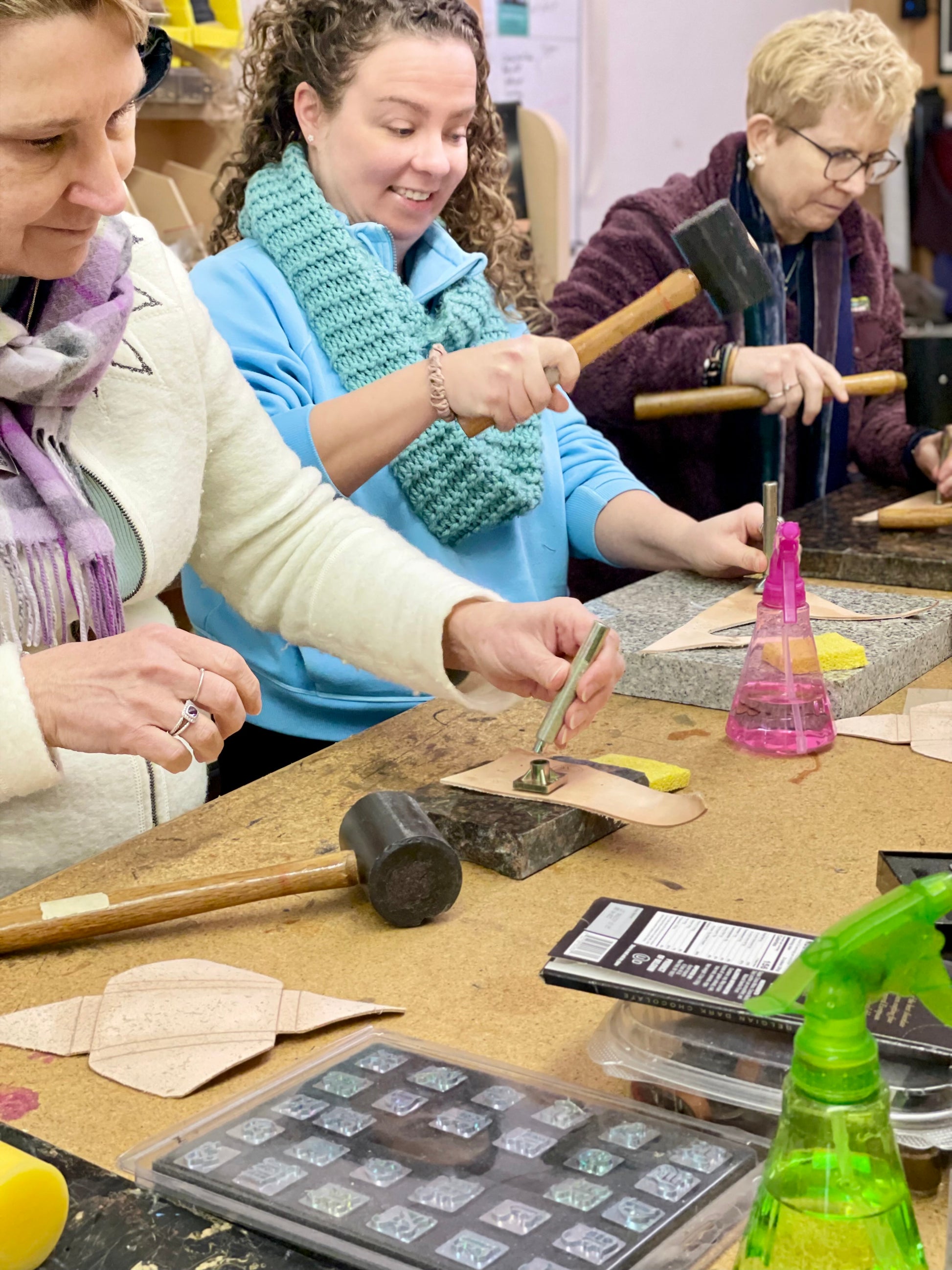 women working in leather workshop