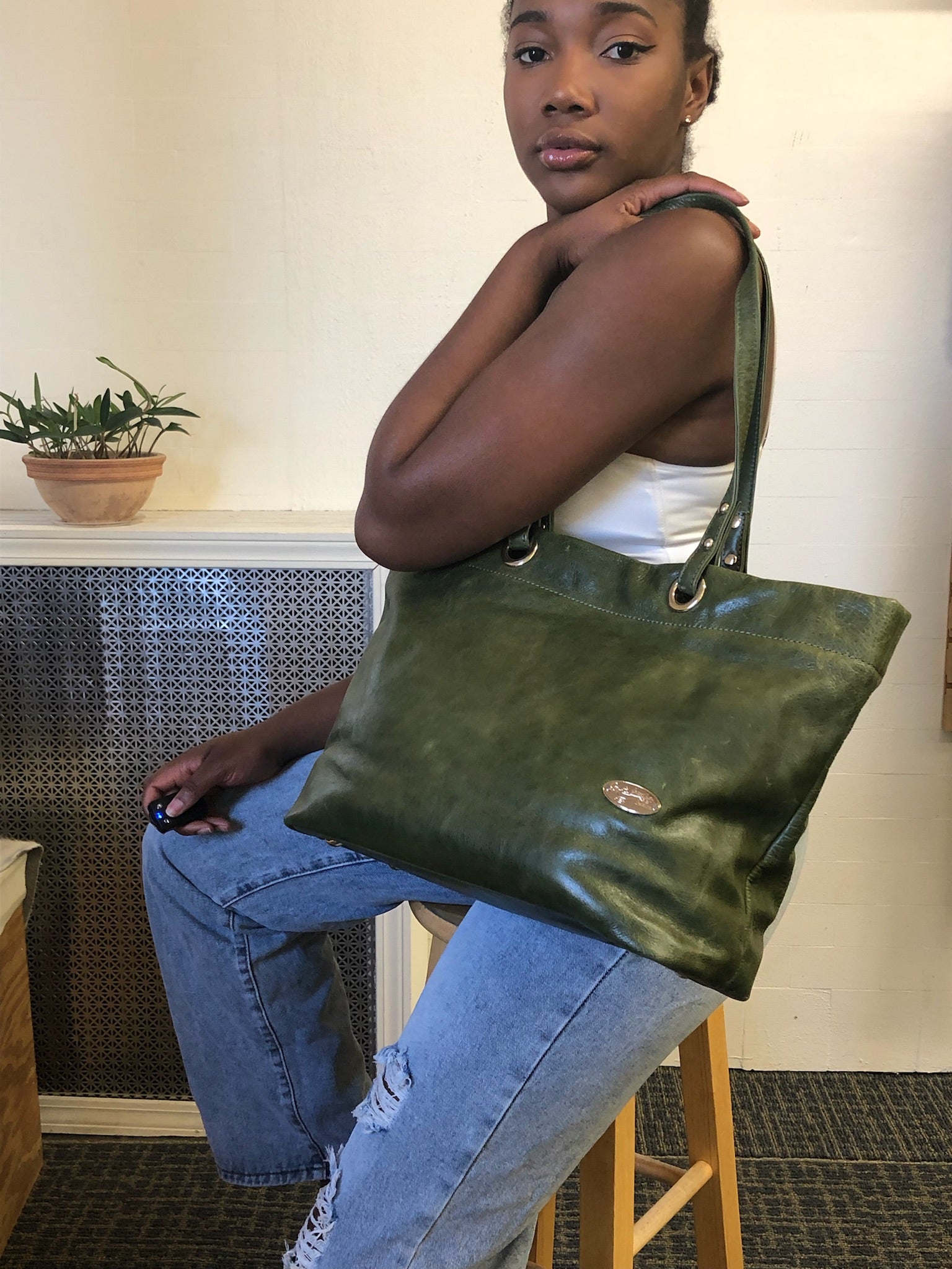 girl with Port Antonio Tote green bag